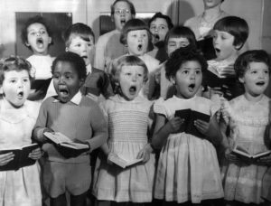 vintage stock photo of a choir of children singing