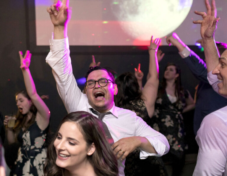 Celebrations at the Rayes wedding reception at the Sigal Museum. Photo by Z. Hartzel.